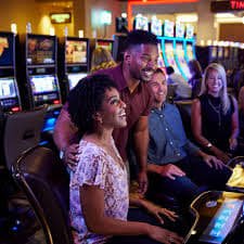 Slot game interface showing Aviator and Sweet Bonanza titles